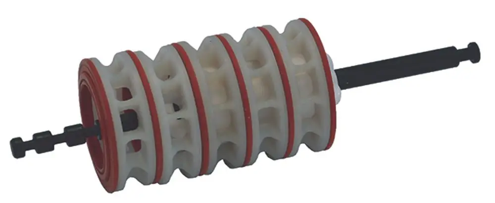 Syr Dichtungspaket mit mehreren Ringen und einer zentralen Achse, ausgestattet für verschiedene Funktionseinheiten in einem kompakten Design.